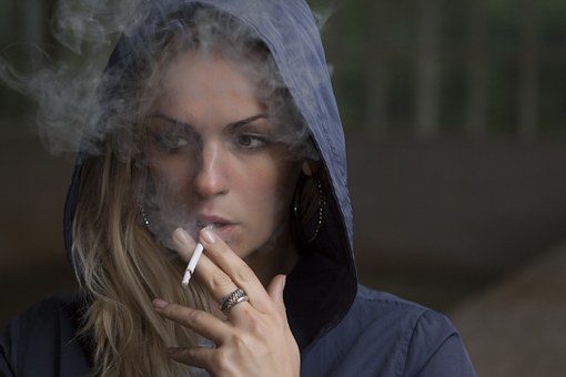 a woman addicted to smoking