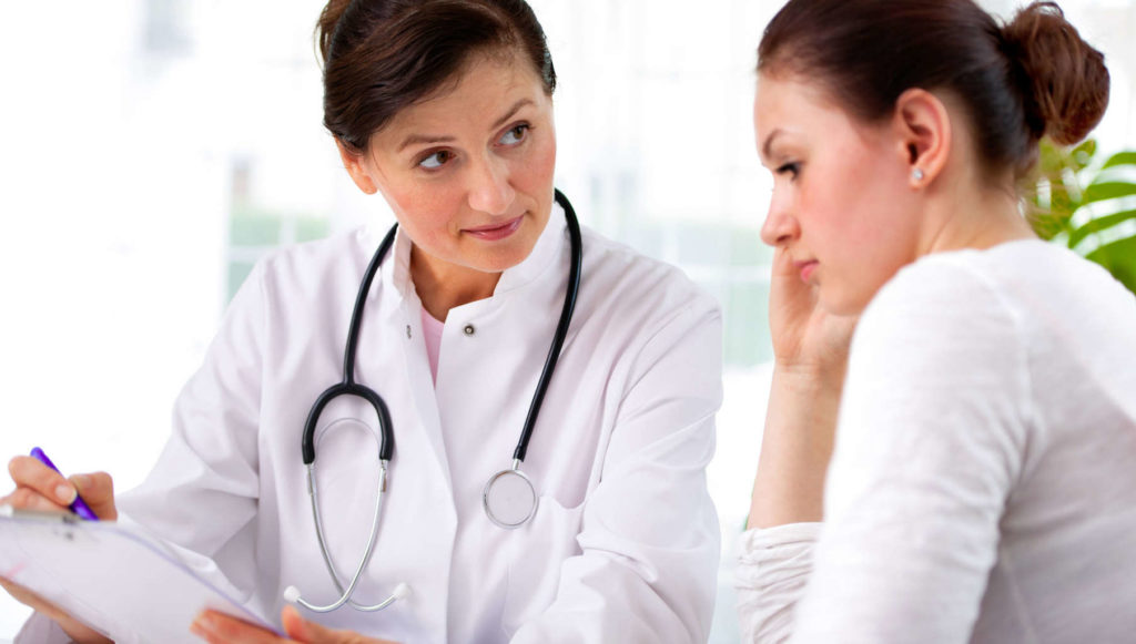 medical advice female doctor and woman