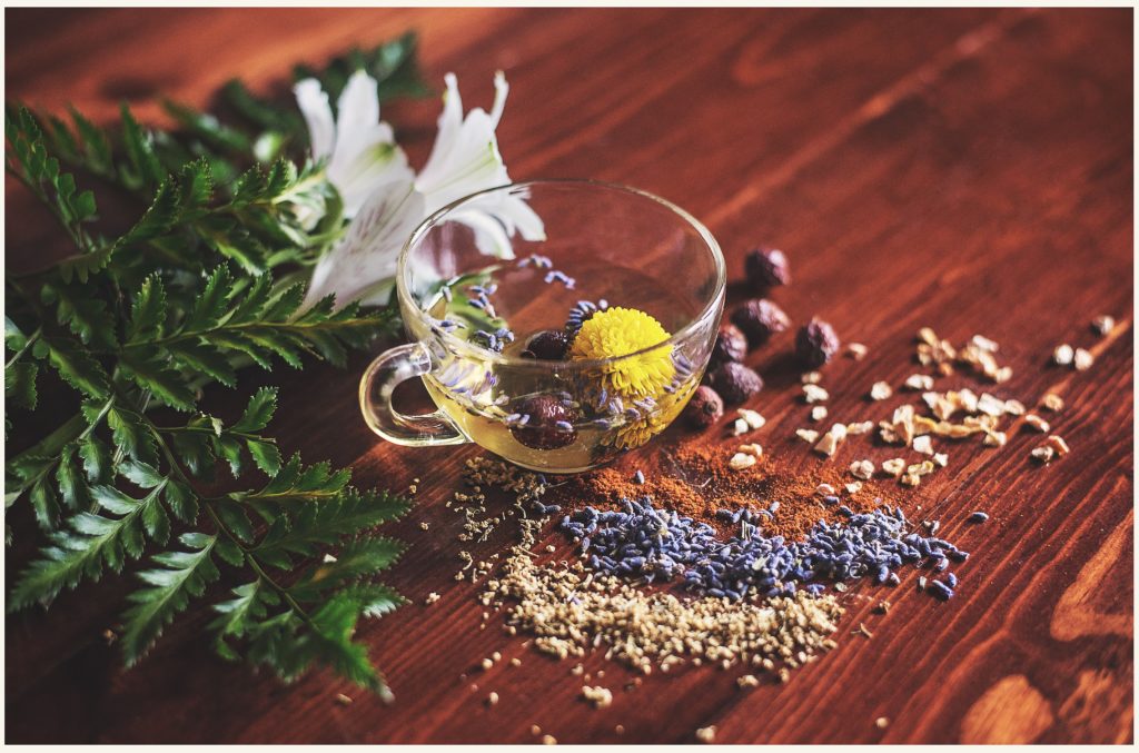 Black tea with spices, herbs and plant.