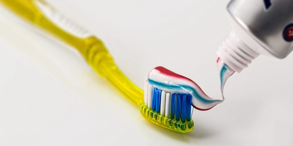 A picture of toothbrush and toothpaste